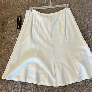Knee length off-white skirt never wore purchased in Macy’s